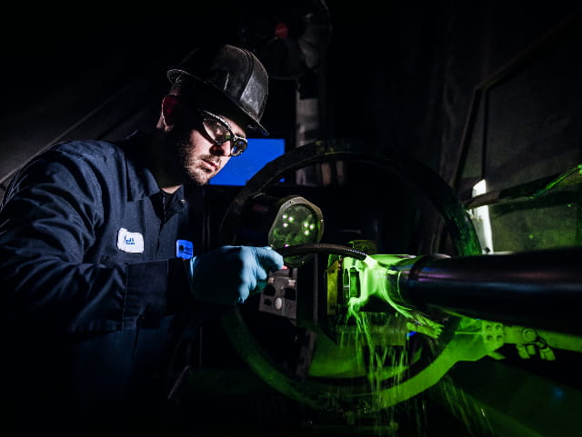 MPI Testing - Magnetic Particle expert performing an MPI test.